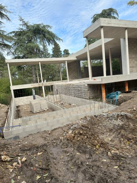 création pull house et piscine à débordement