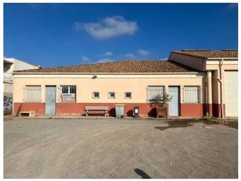 Réaménagement des anciens ateliers municipaux à Villeneuve-lès-Maguelone avec contraintes écologiques, énergétiques et sociales